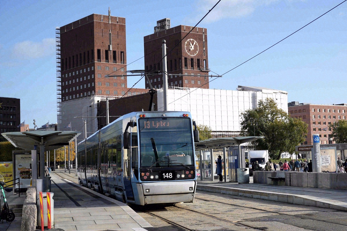 Modern Oslo tram on Line 13 at City Hall